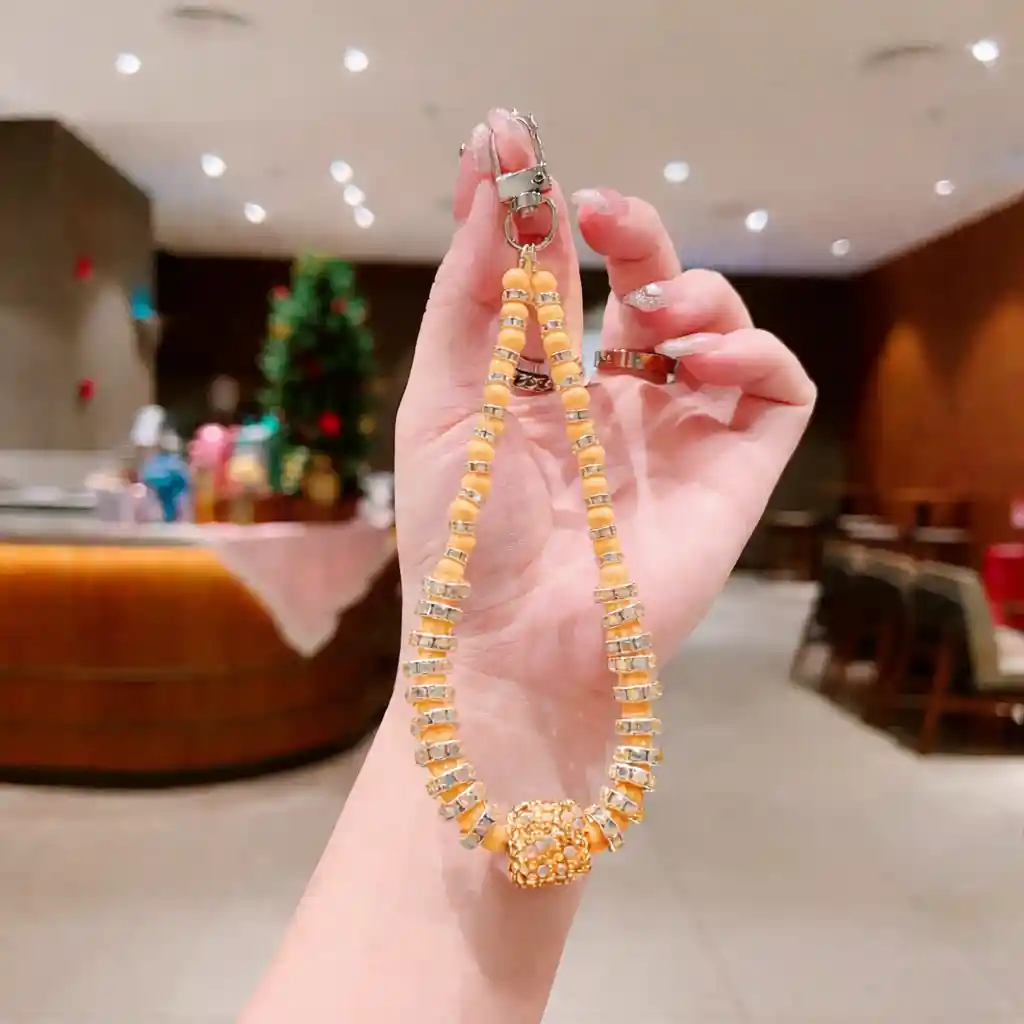 	Premium Phone charm Orange